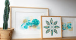 Teal abstract watercolor art print with framed art